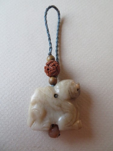 CHINESE TAN JADE WINGED QILONG, DOG, CARVED NUT BEAD ------- QING, 19TH CENTURY