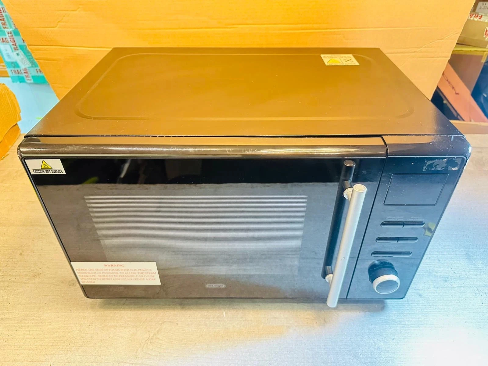 De'Longhi 900W Enamel Cavity Combination Microwave - Black
Opens in a new window or tab