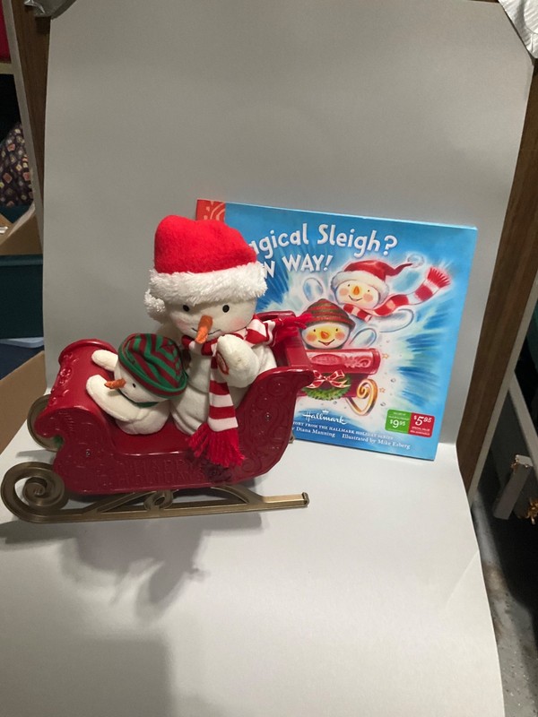 Hallmark 2016 Twinkling Sleigh Ride Snowman Musical and Motion Plush w book