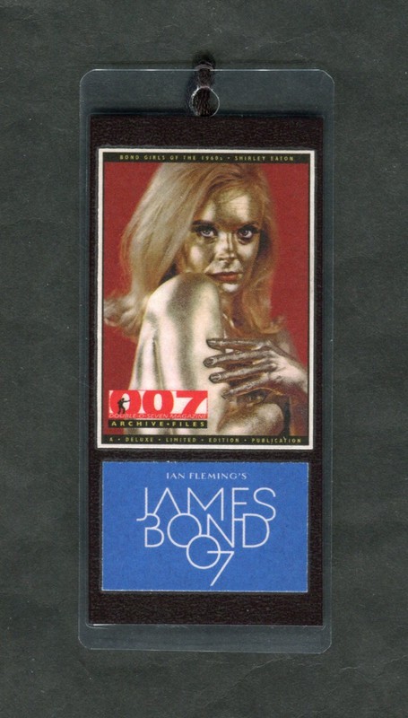 007 GOLDFINGER, JAMES BOND DOUBLE SIDED COVER ART LAMINATED BOOKMARK. NEW! #1.
