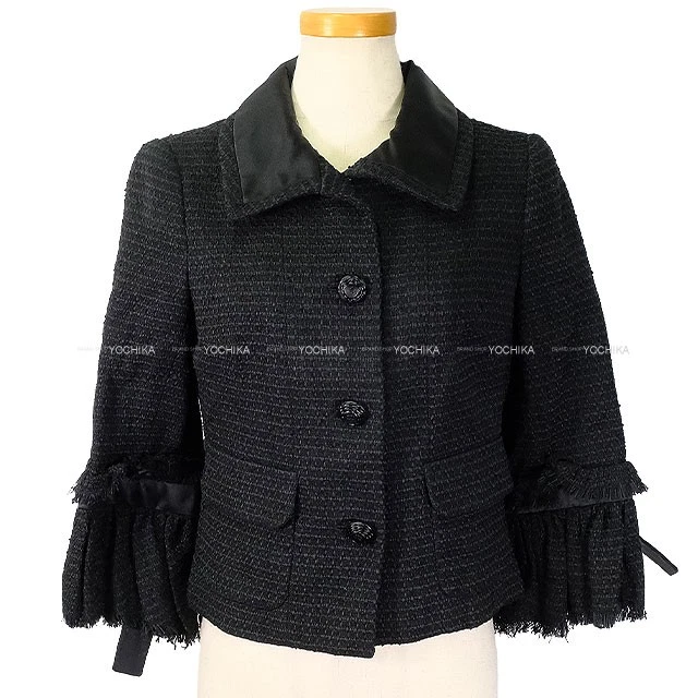 Chanel — 2009 CHANEL Tweed jacket with Coco mark and sleeve ribbon Noir (Black) 34 Ta...