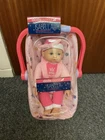 Dolls World:Isabella Doll with Car Seat Carrier (30cm) BRAND NEW & FREE DELIVERY