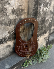 10-String Lyre Harp with Celtic Dragon Carving made of Sheesham and Roosewood