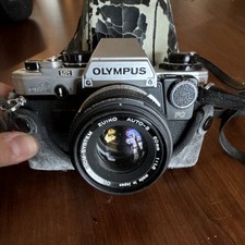 Olympus OM-10 35mm Film Camera with Zuiko Auto-S 50mm f/1.8 Lens and Case