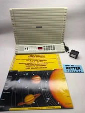 GeoSafari electronic learning game EI-8800 comes with Power Supply n game cards.