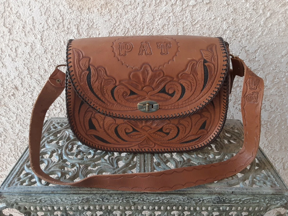 Vintage tooled hotsell leather bag