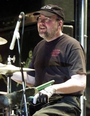 Cheap Trick drummer Bun E Carlos performs as the band opens for Ae - Old Photo