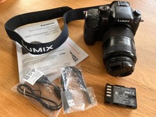 Panasonic lumix DMC-GH4 digital mirrorless camera bundle with 200mm zoom lens