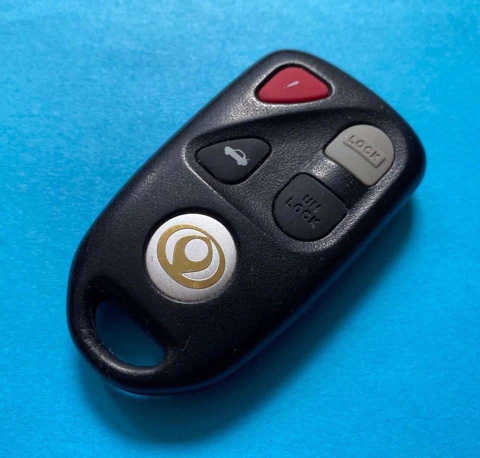 OEM 1995-1999 MAZDA MILLENIA 929 CONTROL REMOTO SIN LLAVE 4 BOTONES KPU41012 ~ ¡COMO NUEVO + LOGOTIPO! Foto 3 de 4