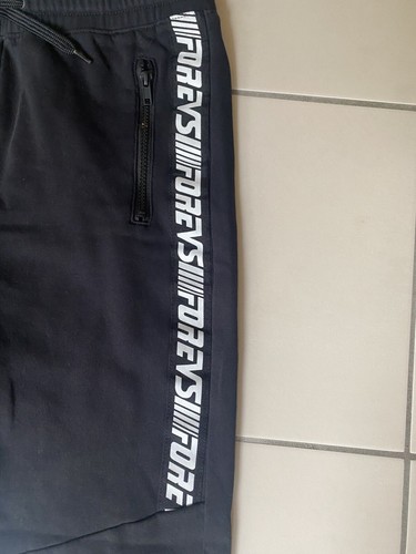 H&M Tracksuit Bottoms Boys Black with FOREVS writing on each side Size 14Y+ - Picture 2 of 5