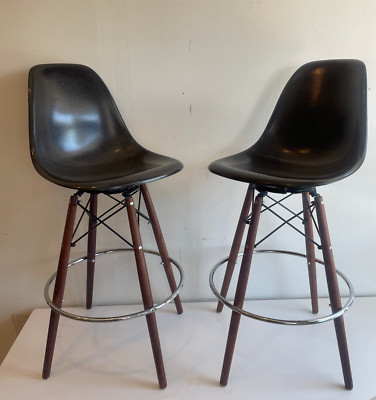 Eames- pair of contemporary black fiberglass swivel barstools | scoop chairs