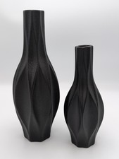 Set Of Black Ceramic Vases With a Modern Geometric Design...