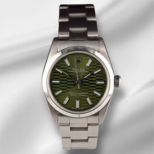 Rolex Oyster Perpetual 31mm Stainless Steel Green Motif Dial Watch Ref 67480