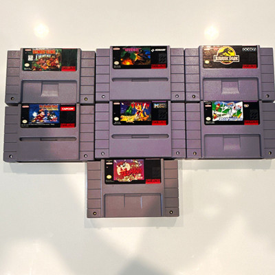 SNES Lot of 7 Game Cartridges Mixed Titles -Donkey Kong, Gradius, Magical Quest