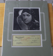 Large matted photo and check signed by David Niven COA