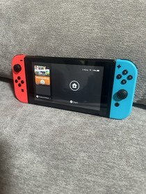 Nintendo Switch with Neon Blue and Neon Red Joy-Con + Mario Case And Accessories