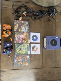 Mixed video game lot including Sony and Nintendo consoles and games