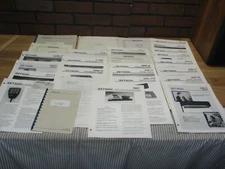 Large lot of zetron instruction manuals, operating manuals & pamphlets.