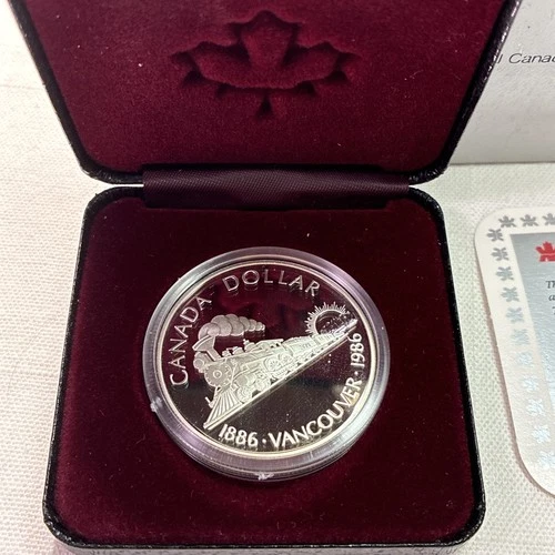 1986 CANADIAN DOLLAR PROOF VANCOUVER TRAIN .500 SILVER COIN WITH BOX & CoA