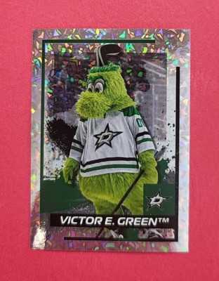 Victor E. Green - Dallas Stars - 2024-25 Topps NHL Sticker - Mascot Foil - #158