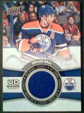 TAYLOR HALL  AUTHENTIC EDMONTON OILERS PIECE OF A GAME-USED JERSEY SP