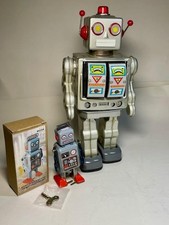 Action "Square-head"  ROBOTS 12" and 5"; one BO & one windup; similar "faces"