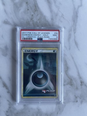 Play! Pokemon 2011 Ruf der Legenden Crosshatch Holo #94 Darkness Energy PSA 9