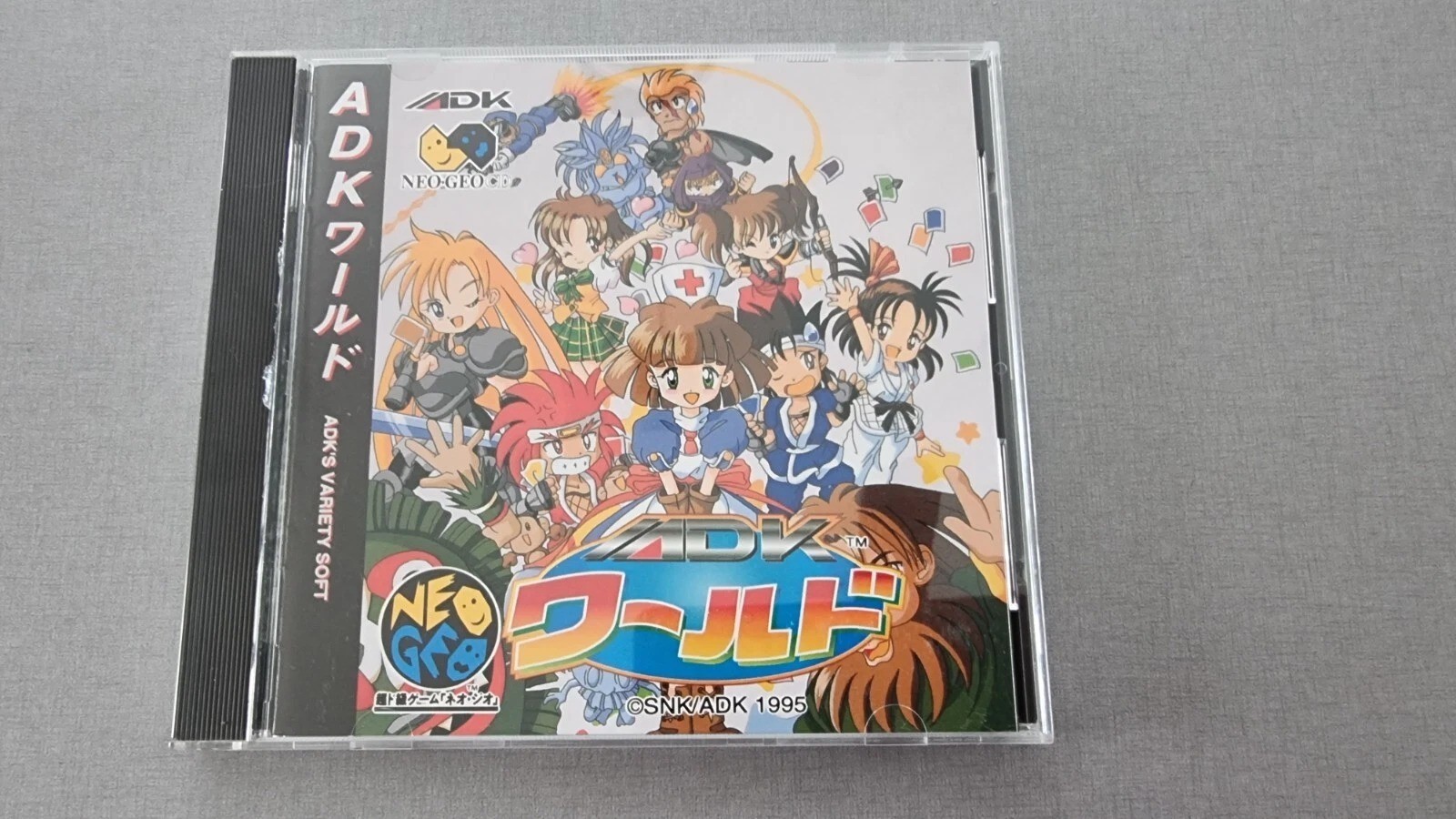 ADK WORLD  sur Neo geo CD  SNK Jap * TBE * + Spin Card