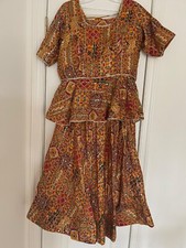 Yellow Peplum Top Lehenga