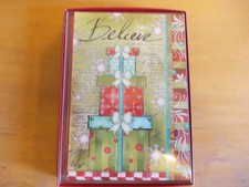 Pack of 10 Leanin' Tree Christmas cards with designed envelopes.