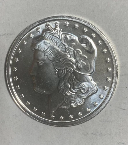 One-ounce silver round composed of .999 fine silver.