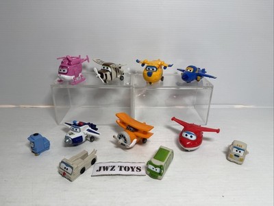 7x Super Wings Mini Figuren Transforming Planes Spielzeug Konvolut - Restposten - 457
