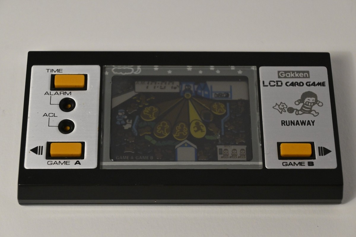 Vintage Gakken Runaway LCD Card Game 1982 handheld electronic game