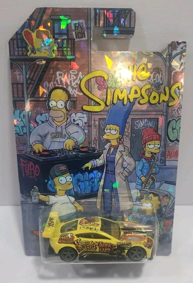 Tarjeta personalizada Hotwheels - Ruedas de goma intercambiables - Aston Martin Vantage GTE Simpsons 1/64 Foto 2 de 4