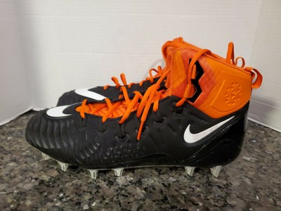 nike football cleats black and orange
