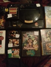 house clearance - megadrive with 9 games without cable for tv