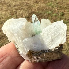 A Gemmy Green Pyramidal Apophylite Crystal on Crystalline White Stilbite
