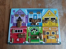 Melissa & Doug wooden lock board with closures