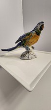 Vintage Italian Parrot Sitting On A Rock