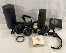 Nikon FG 35mm SLR Film Camera 50mm Lens Sigma II Zoom Lens 70-210mm Extras