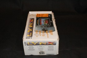 Atari Lynx 2 With 7 games and original box tested working Please read