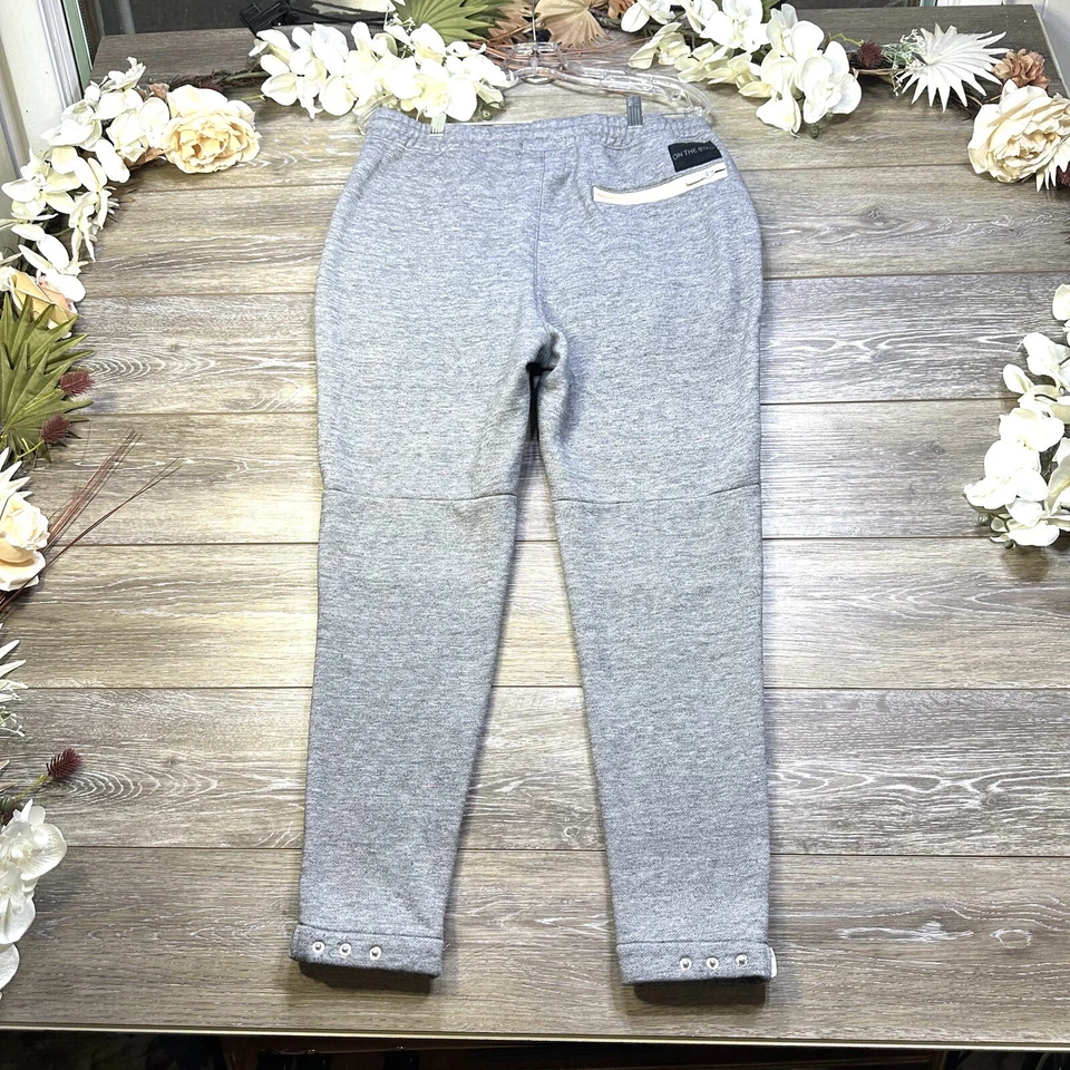 Pantalones deportivos Jogger talla mediana para hombre gris cintura elástica bolsillos con cremallera en el byas Foto 2 de 4