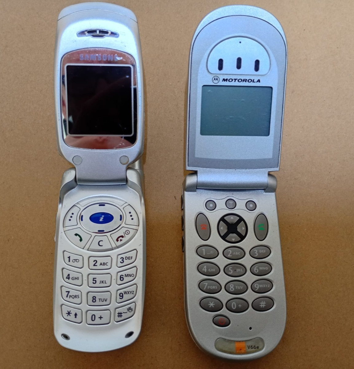 Two vintage mobile flip phones Samsung and Motorola spares or repair