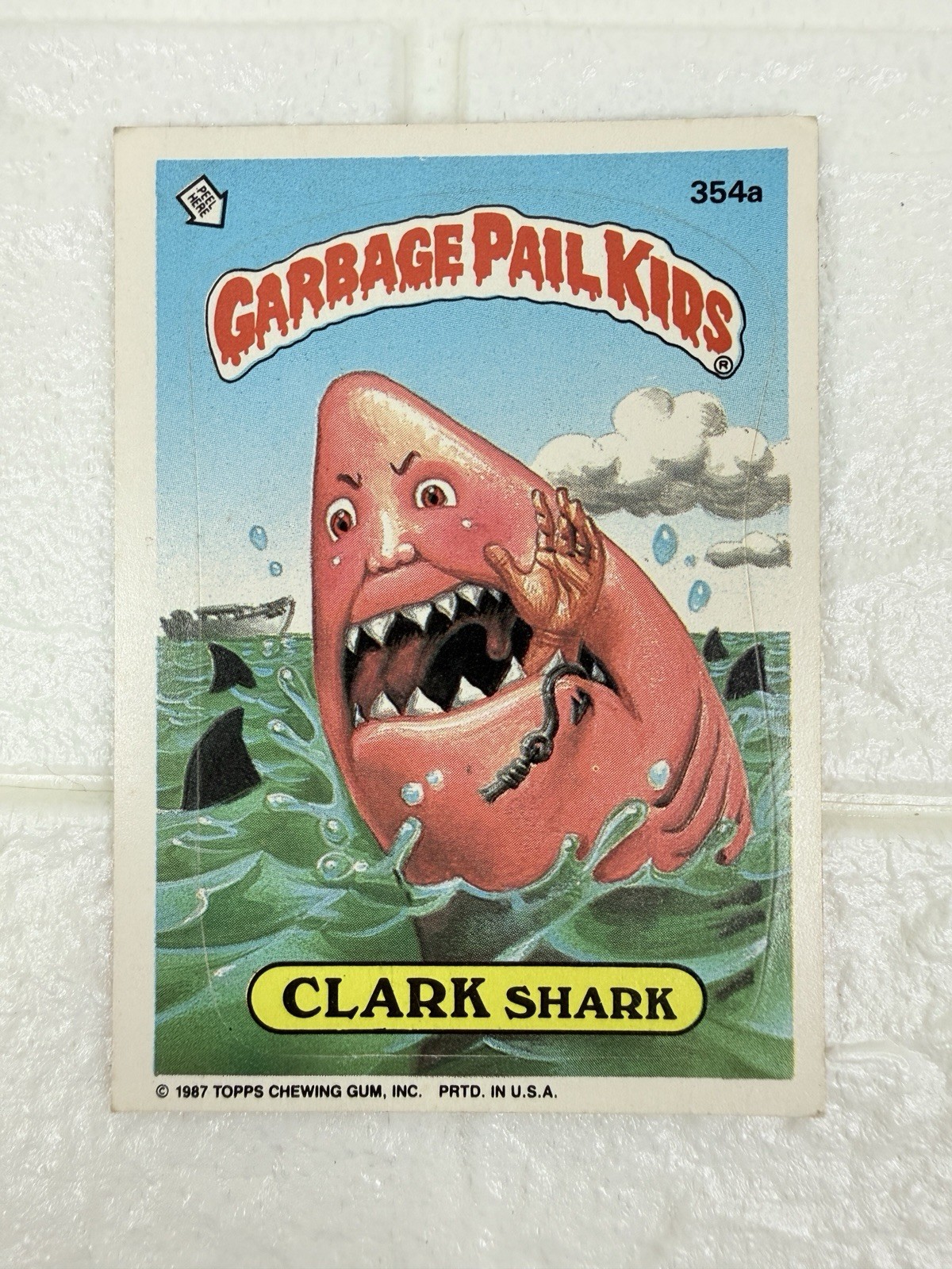 CLARK Shark #354a 1987 Garbage Pail Kids trading card — raw and PSA graded price guide