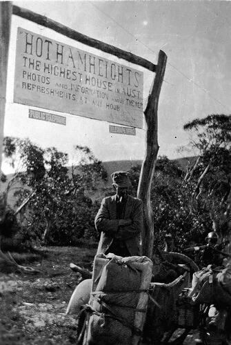 Mount Hotham, Victoria, 1925 A man beside a sign proclaiming 'Hotham Old Photo - Picture 1 of 1