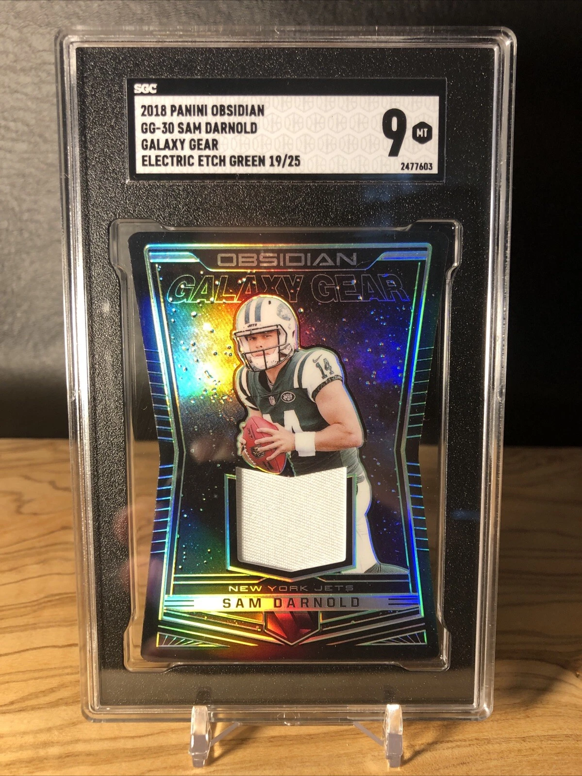 Sam Darnold Panini Obsidian Galaxy Gear Relics #GG30 Electric Etch Orange
