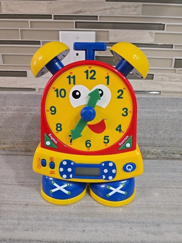 The Learning Journey "Telly" Teaching Time Clock Primary Colors English Spanish