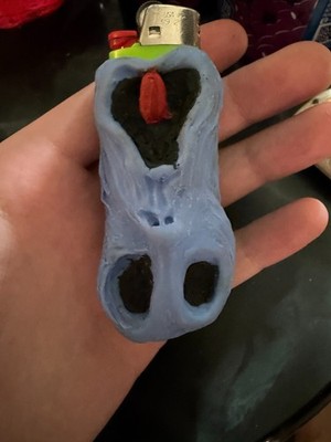 Unlucky Shrunken Head BIC LIGHTER CASE - Hand made of Polymer Clay, sculpture.