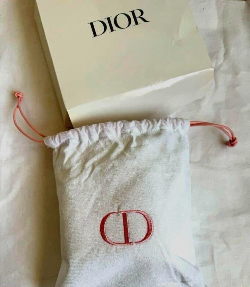 Ensemble pochette bandeau serviette main Christian Dior couleur blanc nouveauté produits de mode
