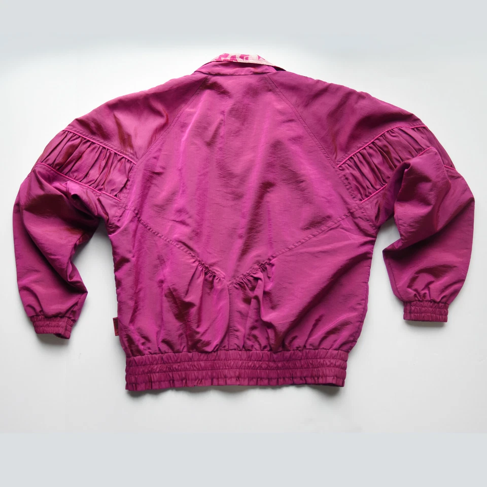 Chaqueta cortavientos Puma vintage rosa iridiscente magenta usada en excelente estado pequeña años 80 90 Foto 3 de 4